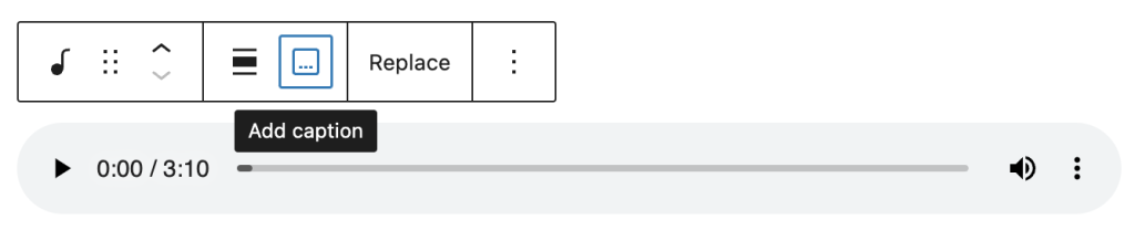 The Add caption option is in the block toolbar next to the alignment options.